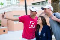 Cherrial Odell, center, poses for a selfie with Bob Bryan, left, and Mike Bryan after a tennis ...