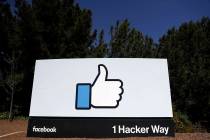 A March 28, 2018, file photo shows a Facebook logo at the company's headquarters in Menlo Park, ...