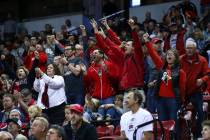 UNLV fans cheer during the second half of a quarterfinal game against San Diego State in the Mo ...