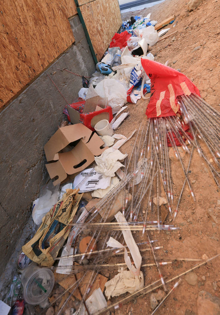 Trash piles up against the Treehouse Las Vegas building at 1022 S. Main Street in Las Vegas on ...