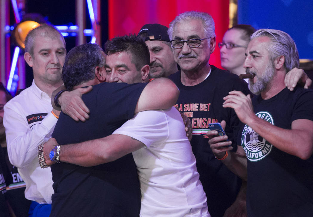 Hossein Ensan hugs his supporters after winning the World Series of Poker Main Event on Wednesd ...