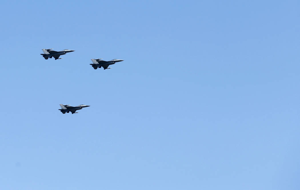 In honor of Ross Perot's commitment to the military and veterans, F-16 fighter jets fly during ...