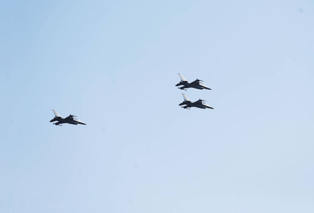 In honor of Ross Perot's commitment to the military and veterans, F-16 fighter jets fly during ...