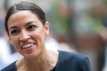 In this June 27, 2018 photo, Alexandria Ocasio-Cortez, is photographed while being interviewed ...