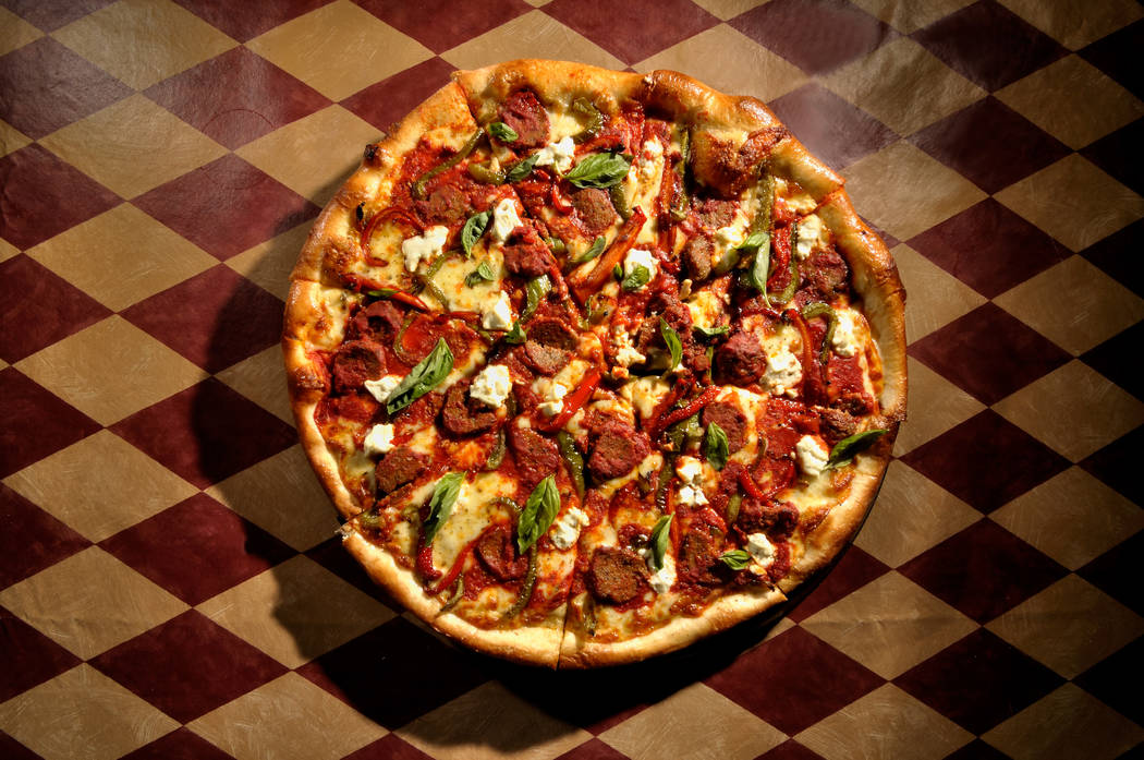 Metro Pizza owners John Arena and Sam Facchini began making New York style pizza in Las Vegas i ...