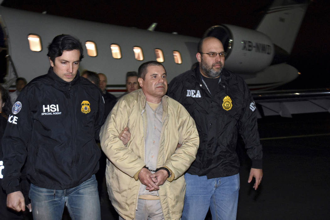 In this Jan. 19, 2017, file photo provided by U.S. law enforcement, authorities escort Joaquin ...