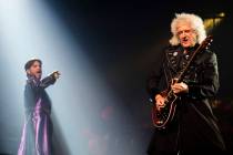 Adam Lambert and Queen guitarist Brian May perform at Park MGM theater in Las Vegas, Sept. 1, 2 ...