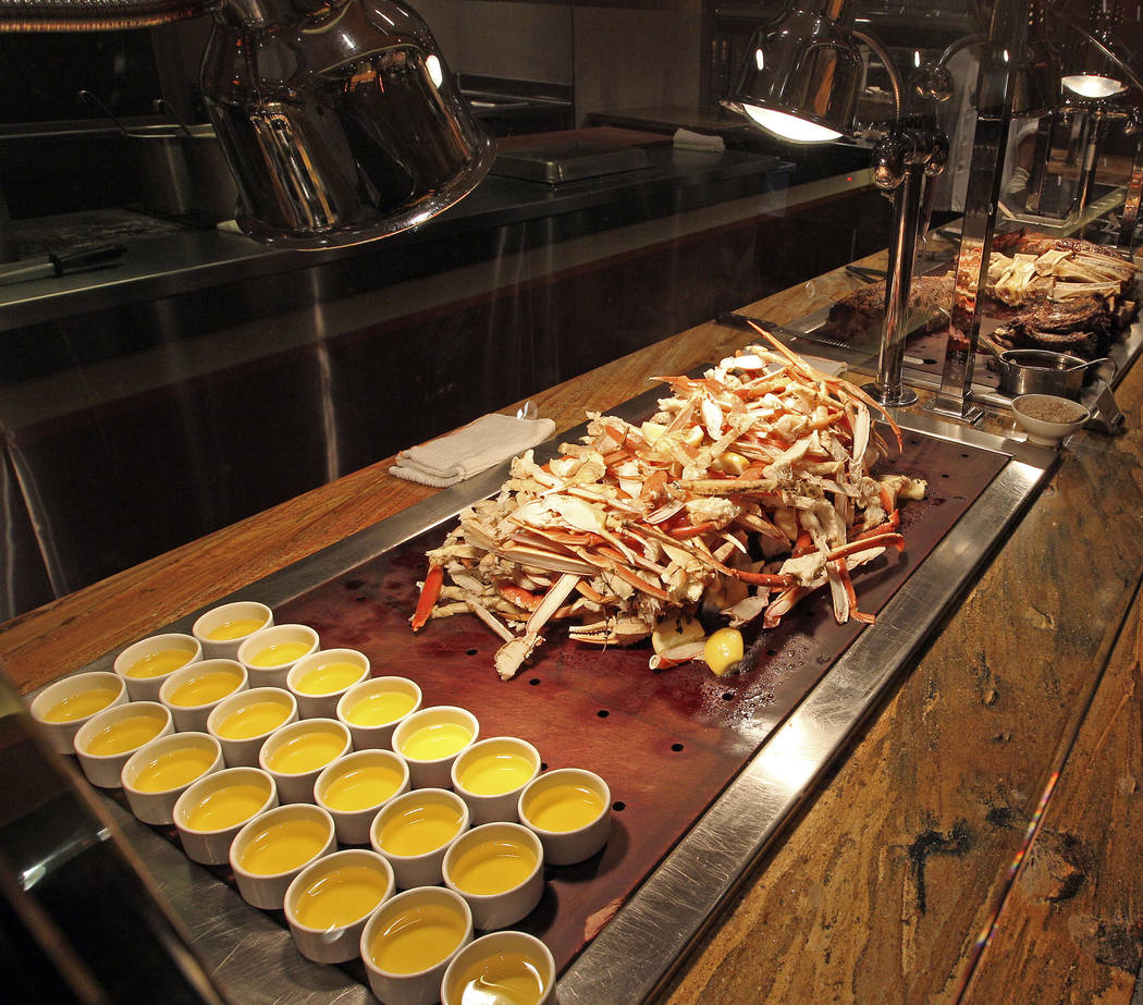 The Wicked Spoon's crab legs serving station at The Cosmopolitan of Las Vegas. (John Gurzinski/ ...