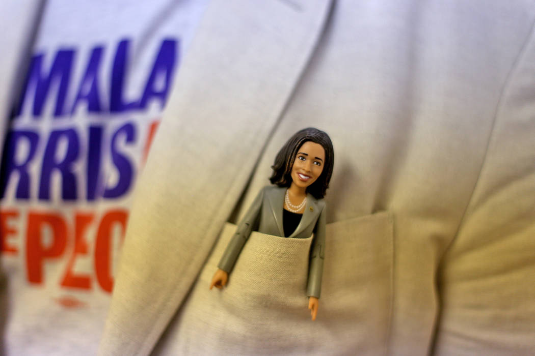 Chris Miller, the former chairman of the Nevada Democratic Party, shows off his Kamala Harris d ...