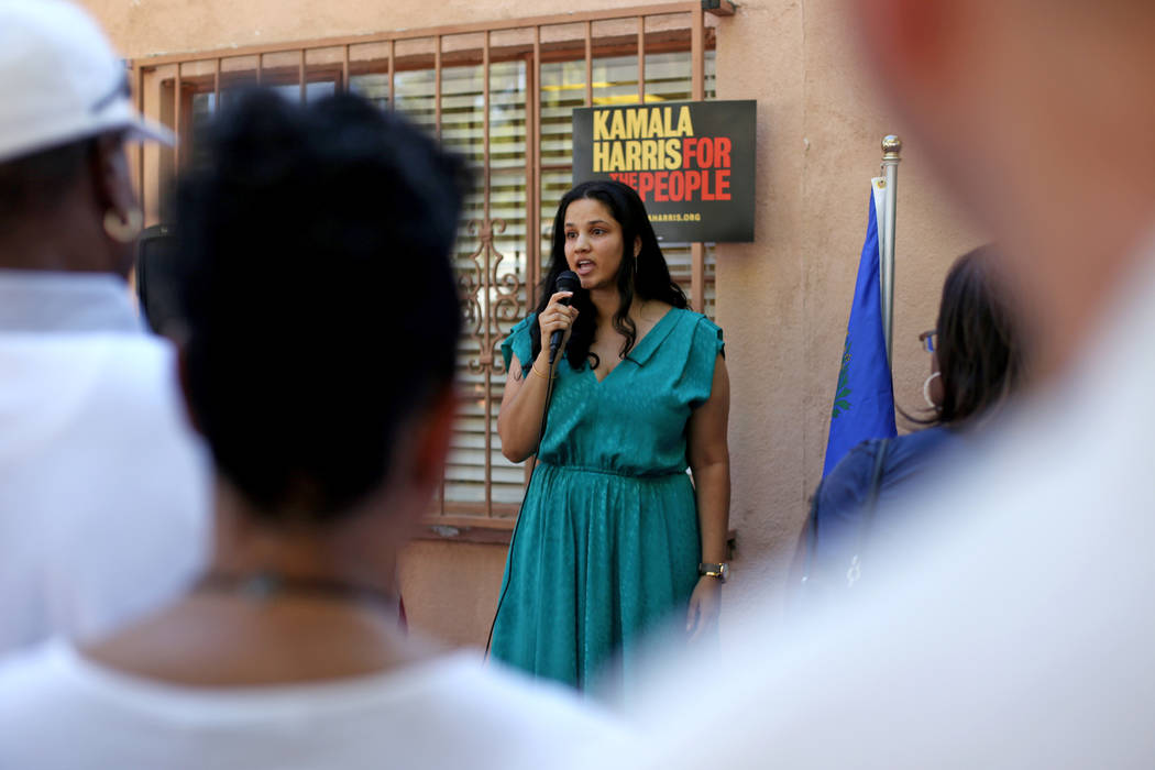 Rachel Pinto, a field organizer, addresses guests at a meet-n-greet with campaign staff at the ...