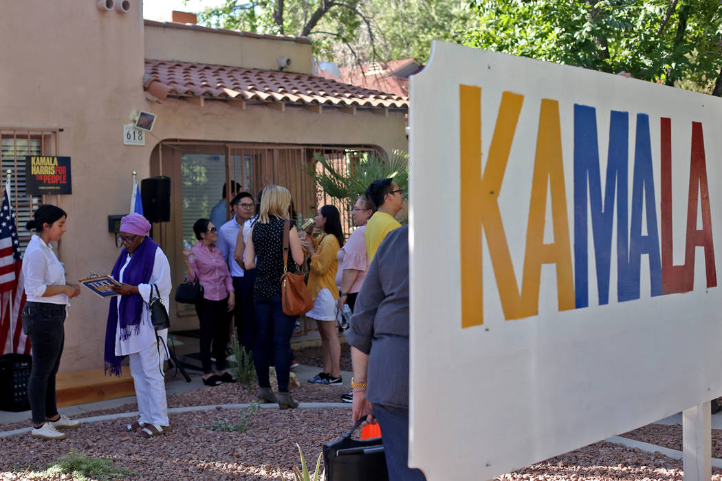 Guests socialize at the new office for Kamala Harris' 2020 presidential campaign in Las Vegas, ...