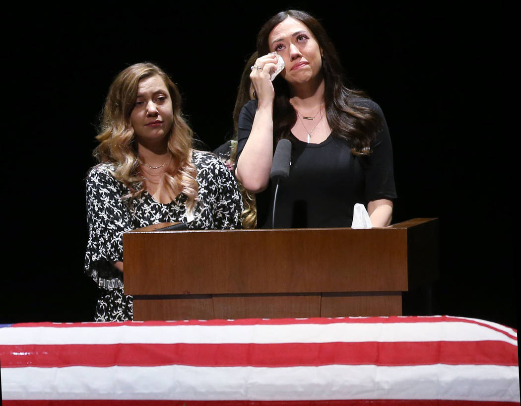 Daughters Alexis Dessau, right, and Alayna Burns during funeral services for former Metropolita ...