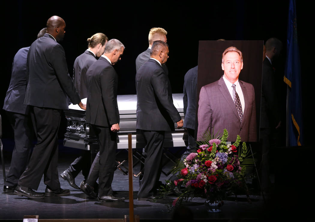 Pallbearers move the casket during funeral services for former Metropolitan Police Department C ...