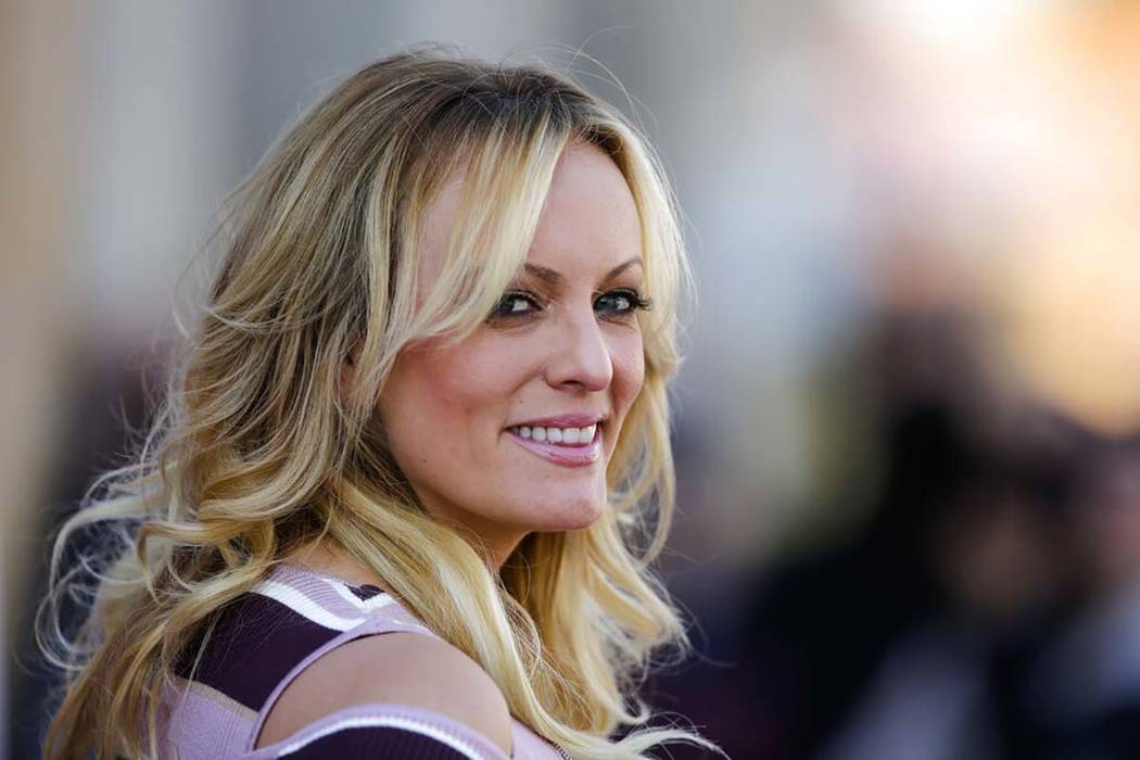 A Oct. 11, 2018, file photo, shows adult film actress Stormy Daniels attenting the opening of t ...