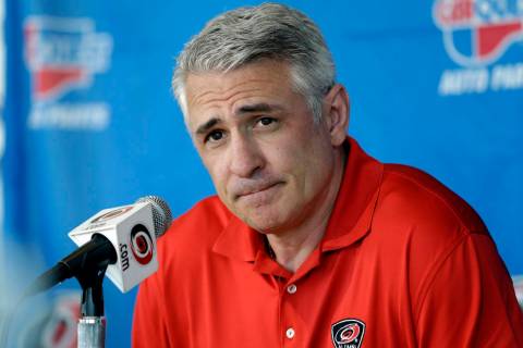 Ron Francis, at the time the general manager of the Carolina Hurricanes, takes questions from m ...