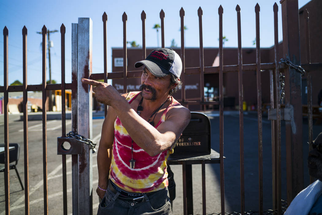 John Bell talks about living homeless while waiting in line for food on Foremaster Lane near do ...