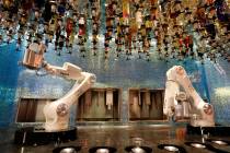 Robots demonstrate to make drinks at Tipsy Robot in the Miracle Mile Shops in Las Vegas, Monday ...