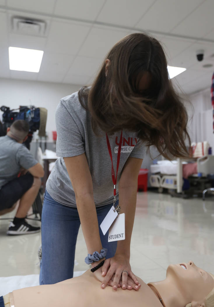 Mallory Gonzales, 17, practices breathing on a medical doll on Thursday, July 18, 2019 in Las V ...