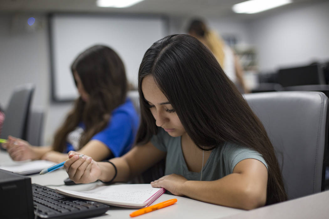 Britney Chavez works on math in the Math Bridge class at UNLV in Las Vegas, Thursday, July 18, ...