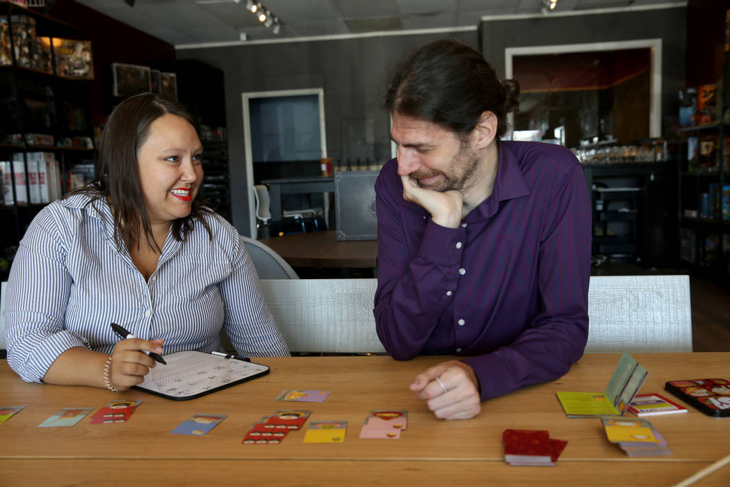 Emily Labejof and Matt Smiciklas, co-owners of Boarding School Games, demonstrate the game Sush ...