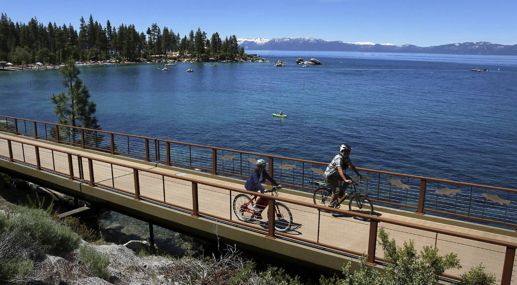 FILE - This June 25, 2019 file photo shows cyclists on the Tahoe East Shore Trail near Glenbroo ...