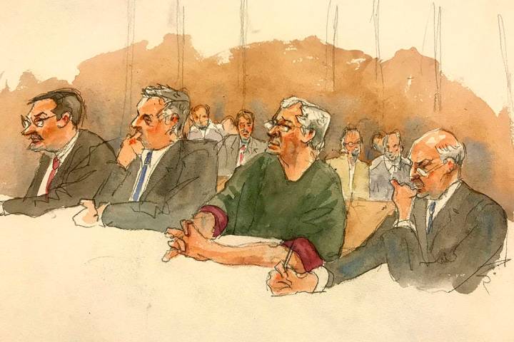 In this courtroom sketch, defendant Jeffrey Epstein, second from right, listens along with defe ...