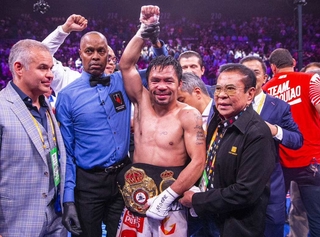 Manny Pacquiao with his belt after defeating Keith Thurman in their WBA super welterweight worl ...