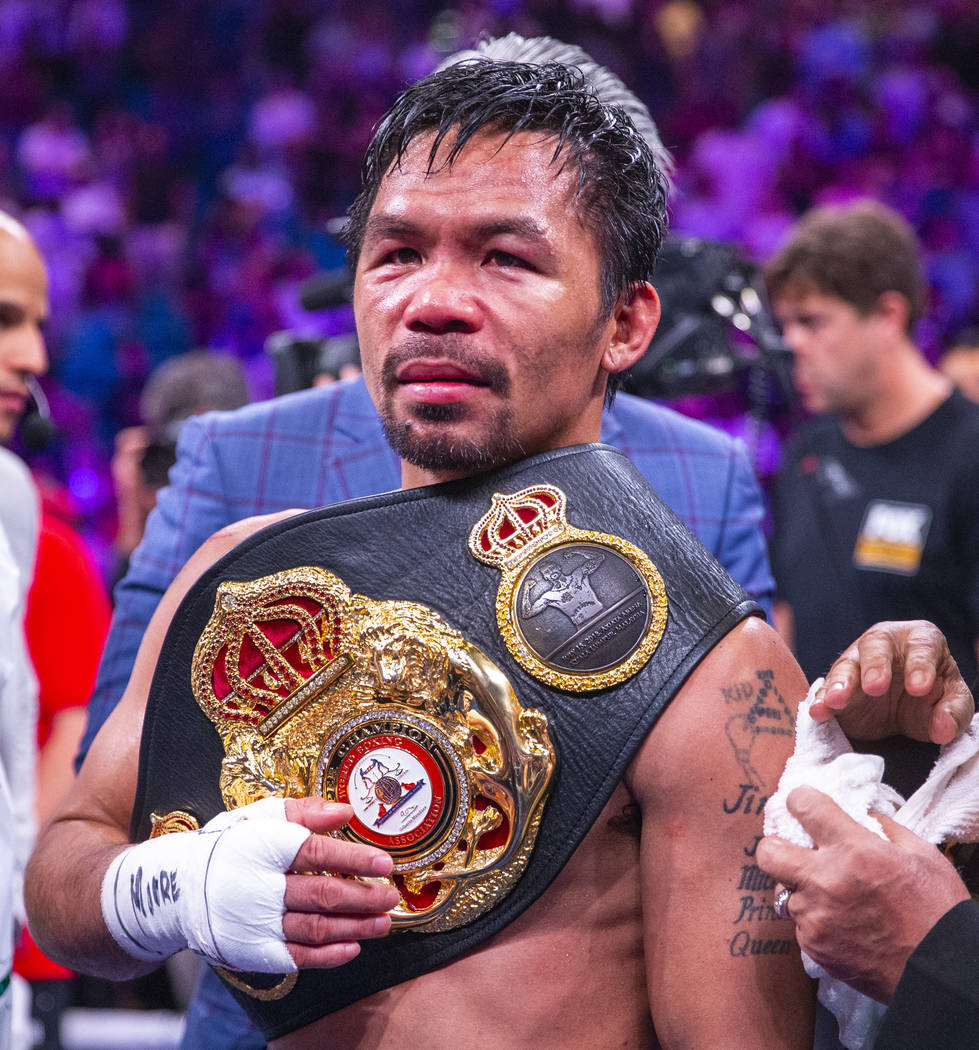Manny Pacquiao with his belt after defeating Keith Thurman in their WBA sup...