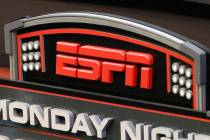 FILE - This Sept. 16, 2013, file photo shows the ESPN logo prior to an NFL football game betwee ...