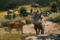 FILE - This file image released by Disney shows, from left, young Simba, voiced by JD McCrary, ...