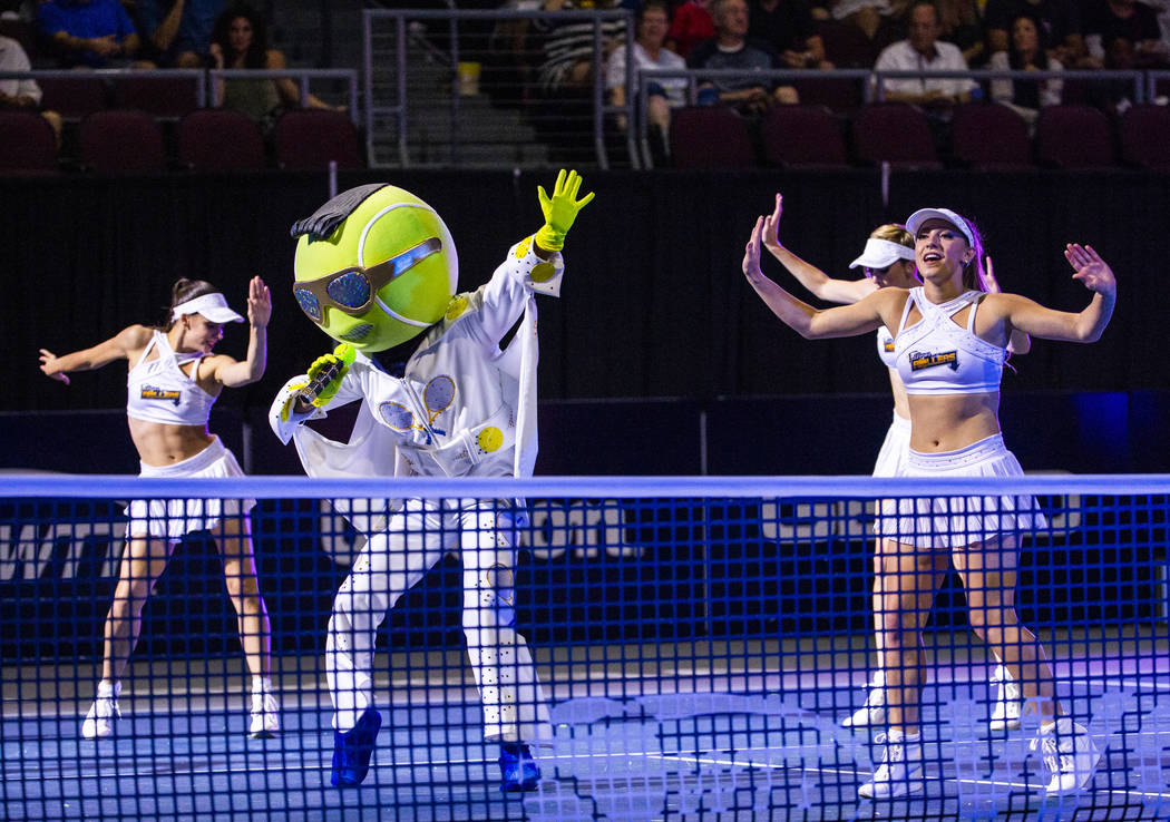 The Vegas Rollers' mascot King performs with the Rollers Dancers during a break between sets ve ...