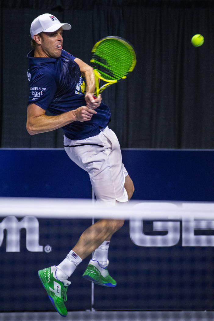 Vegas Rollers' Sam Querrey sends a backhand over the net as he closes the gap in score during h ...