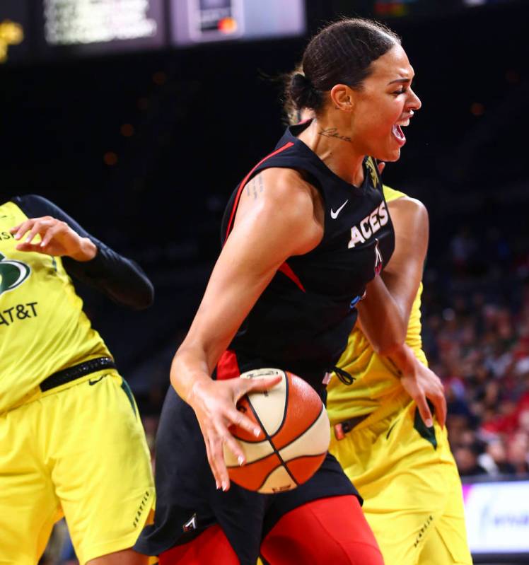 Las Vegas Aces' Liz Cambage drives to the basket against Seattle Storm during the first half of ...