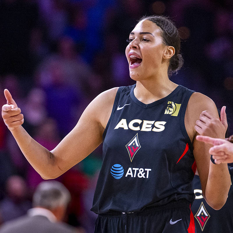 Las Vegas Aces center Liz Cambage (8) pumps up her teammates during the overtime period versus ...