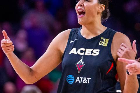 Las Vegas Aces center Liz Cambage (8) pumps up her teammates during the overtime period versus ...