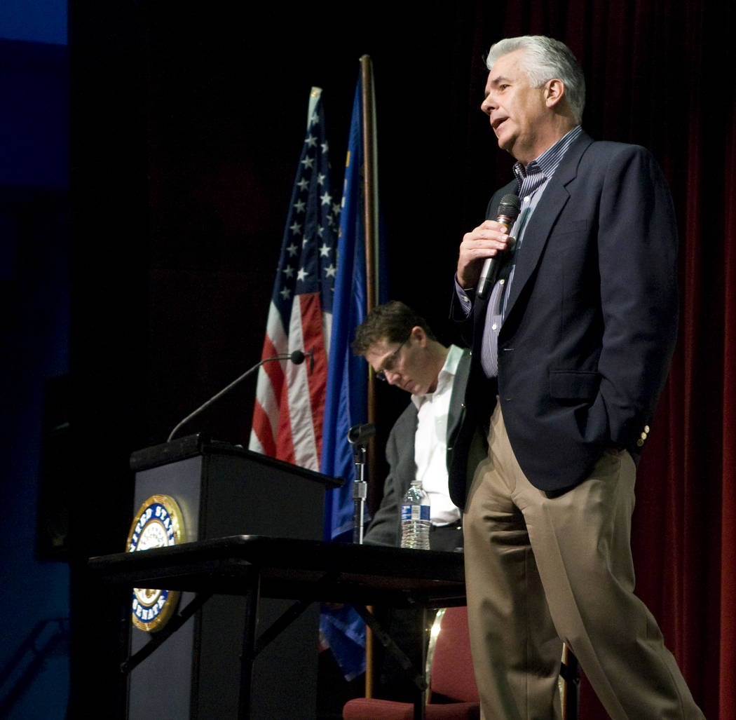Sen. John Ensign, R-Nev., answers a question about his extra-marital affair during a town hall ...