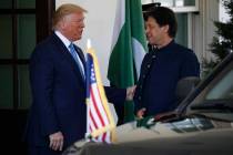 President Donald Trump greets Pakistan's Prime Minister Imran Khan as he arrives at the White H ...