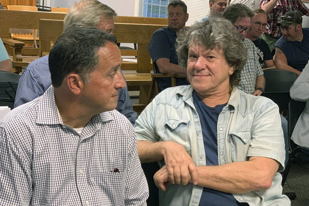 FILE - In this Tuesday, July 16, 2019, file photo, Michael Lang, right, Woodstock 50 co-produce ...