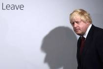 In a Friday, June 24, 2016, file photo, Vote Leave campaigner Boris Johnson arrives for a press ...