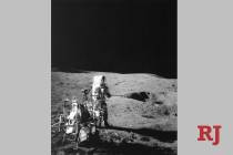 In this Feb. 6, 1971, file photo, Apollo 14 Astronaut Alan B. Shepard Jr., who hit three golf b ...