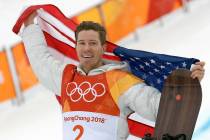 Gold medal winner Shaun White celebrates after the men's halfpipe finals at the 2018 Winter Oly ...