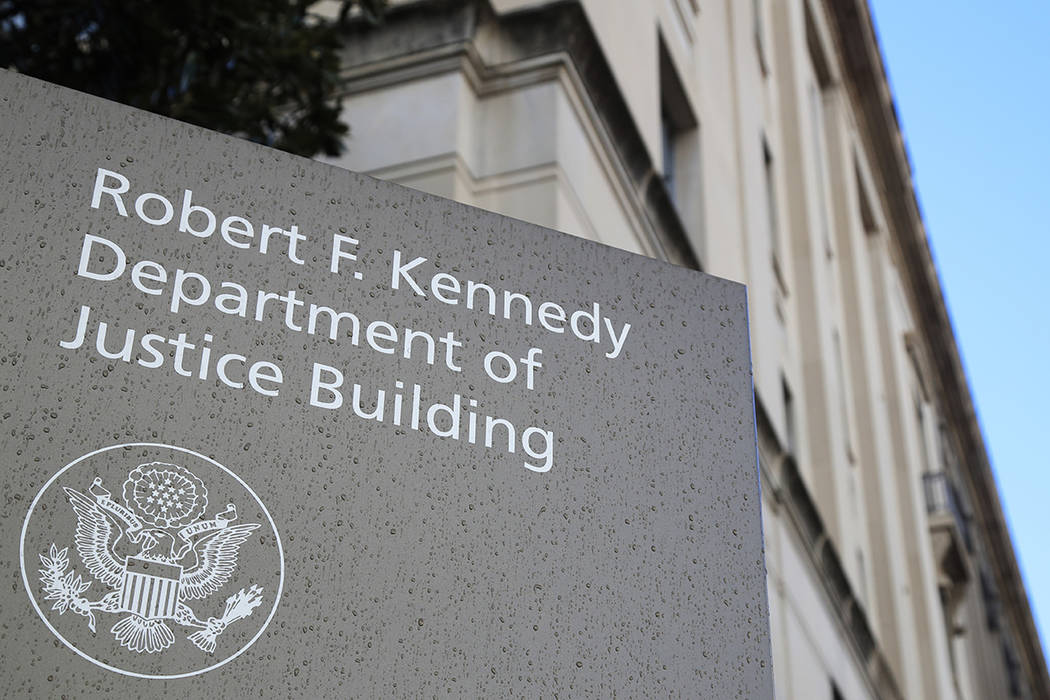 FILE - This Friday, March 22, 2019, file photo shows the Department of Justice Building in Wash ...