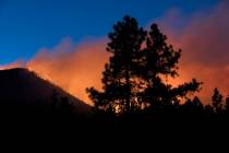 In this Sunday, July 21, 2019, photo, a wildfire burns through the Coconino National Forest, no ...
