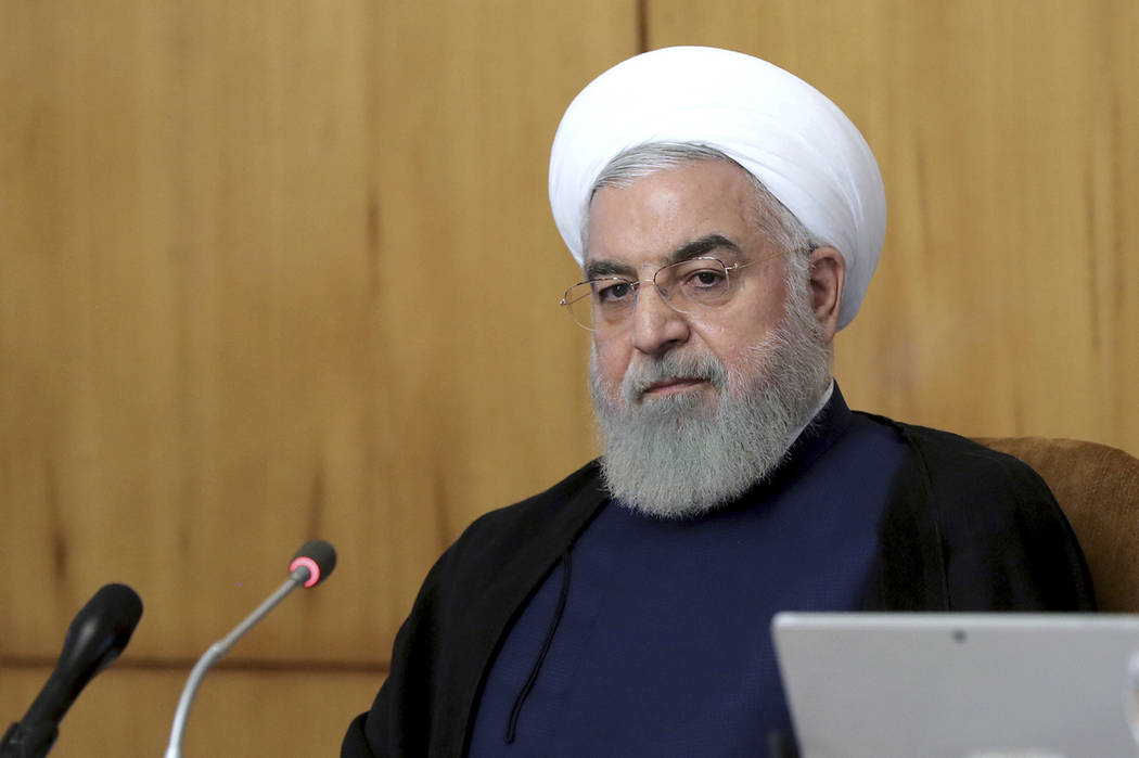 In this photo released by the office of the Iranian Presidency, President Hassan Rouhani speaks ...