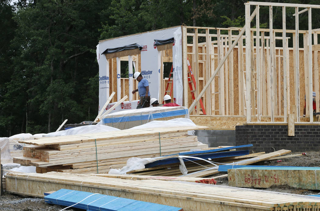 In this June 13, 2019, photo construction continues on a new home in Mechanicsville, Va. On Wed ...