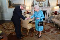 Britain's Queen Elizabeth II welcomes newly elected leader of the Conservative party Boris John ...