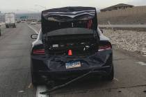 A Nevada Highway Patrol vehicle with a trooper inside was struck by another vehicle on northbou ...