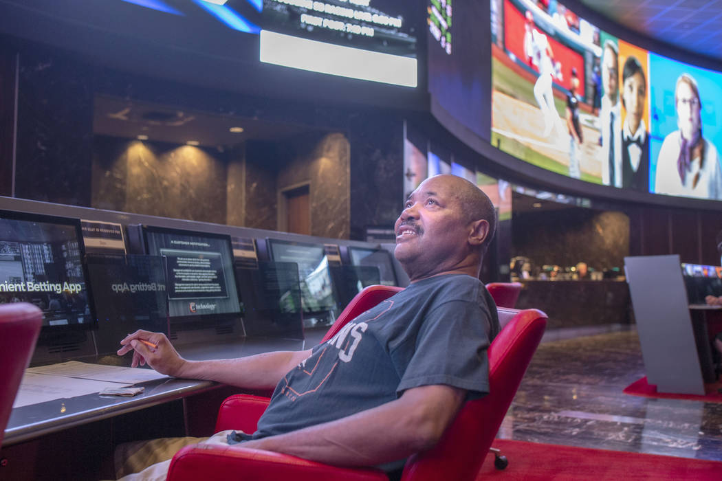 Las Vegas local Al Armer betts on different horse races at the CG Technology sportsbook at the ...