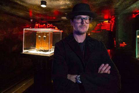 Ghost hunter Zak Bagans poses with his Dybbuk Box, known as the world's most haunted object, at ...