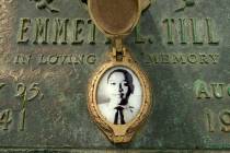 FILE - This May 4, 2005, file photo shows Emmett Till's photo on his grave marker in Alsip, Ill ...